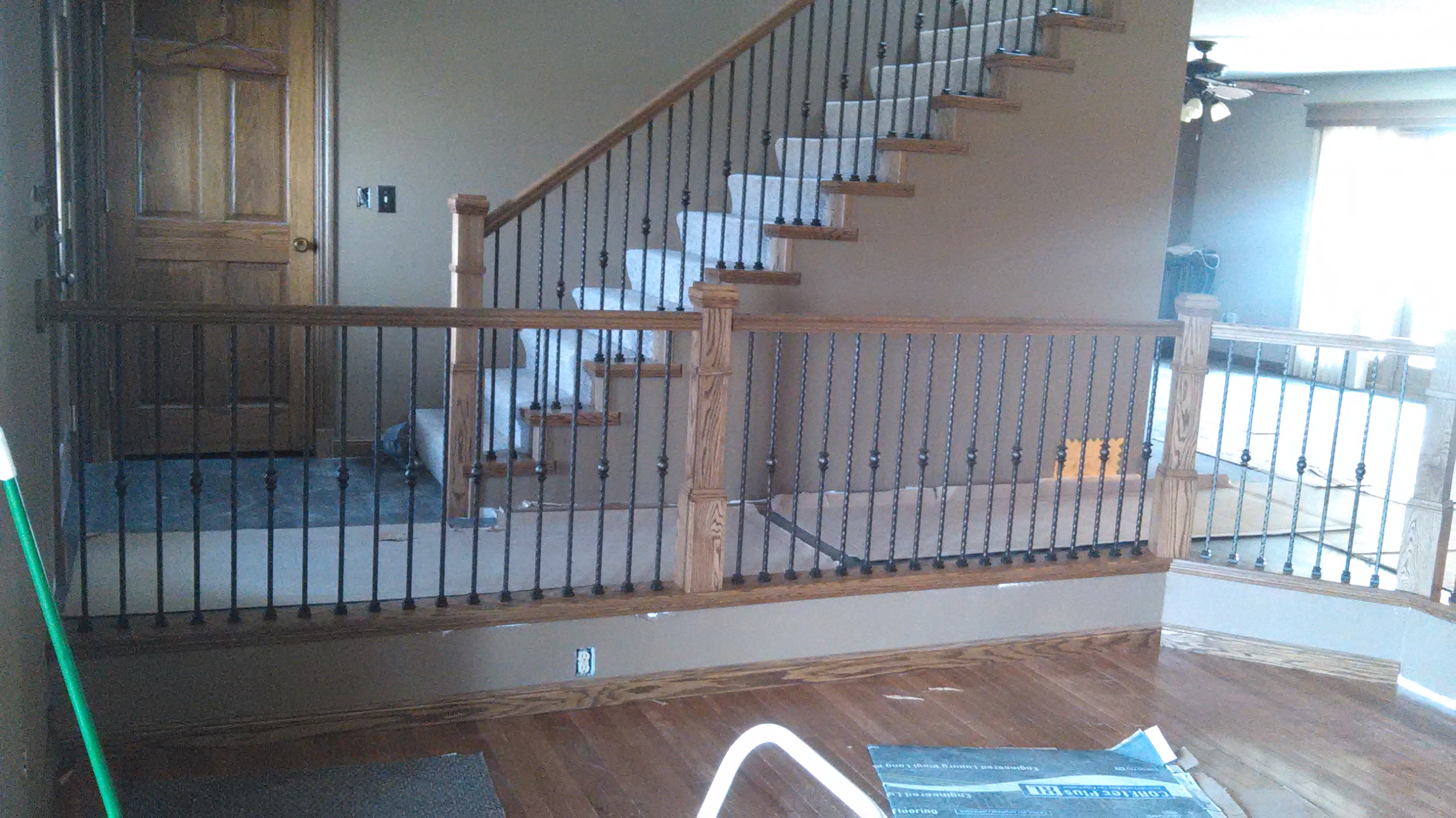 beautiful home remodel with custom railing